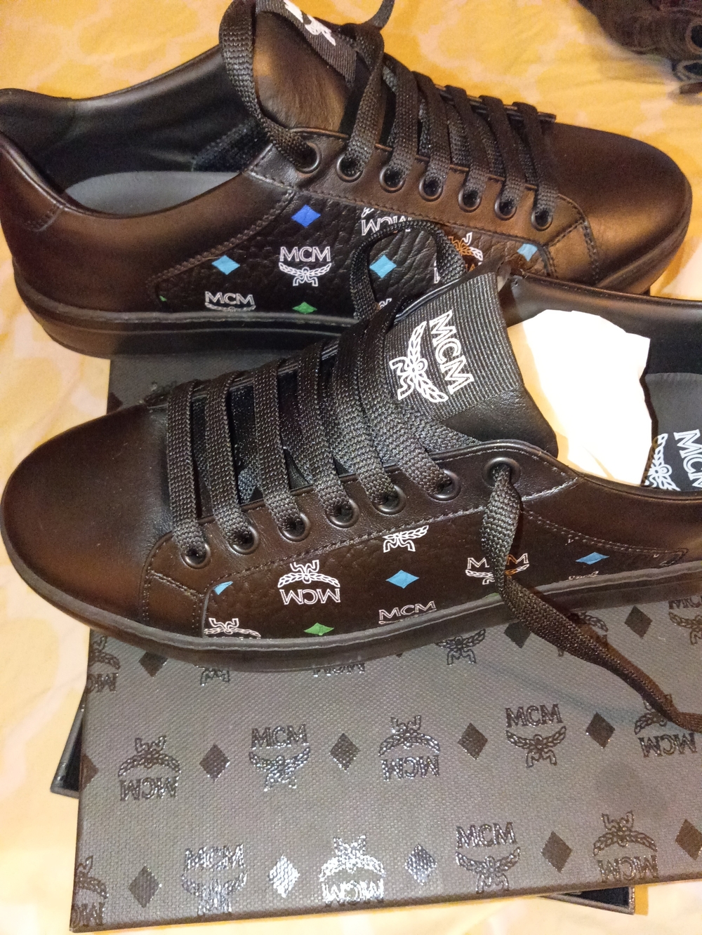 MCM Black Leather Low-Top Sneakers with Blue and Green Diamond Accents
